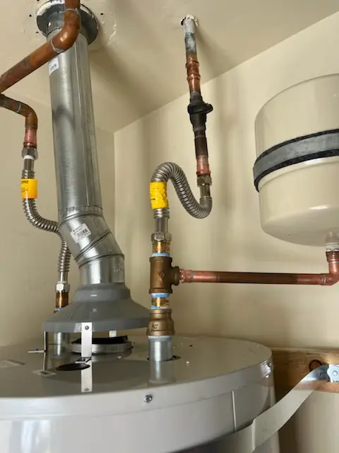 Water heater installation and plumbing repair in McNair Village